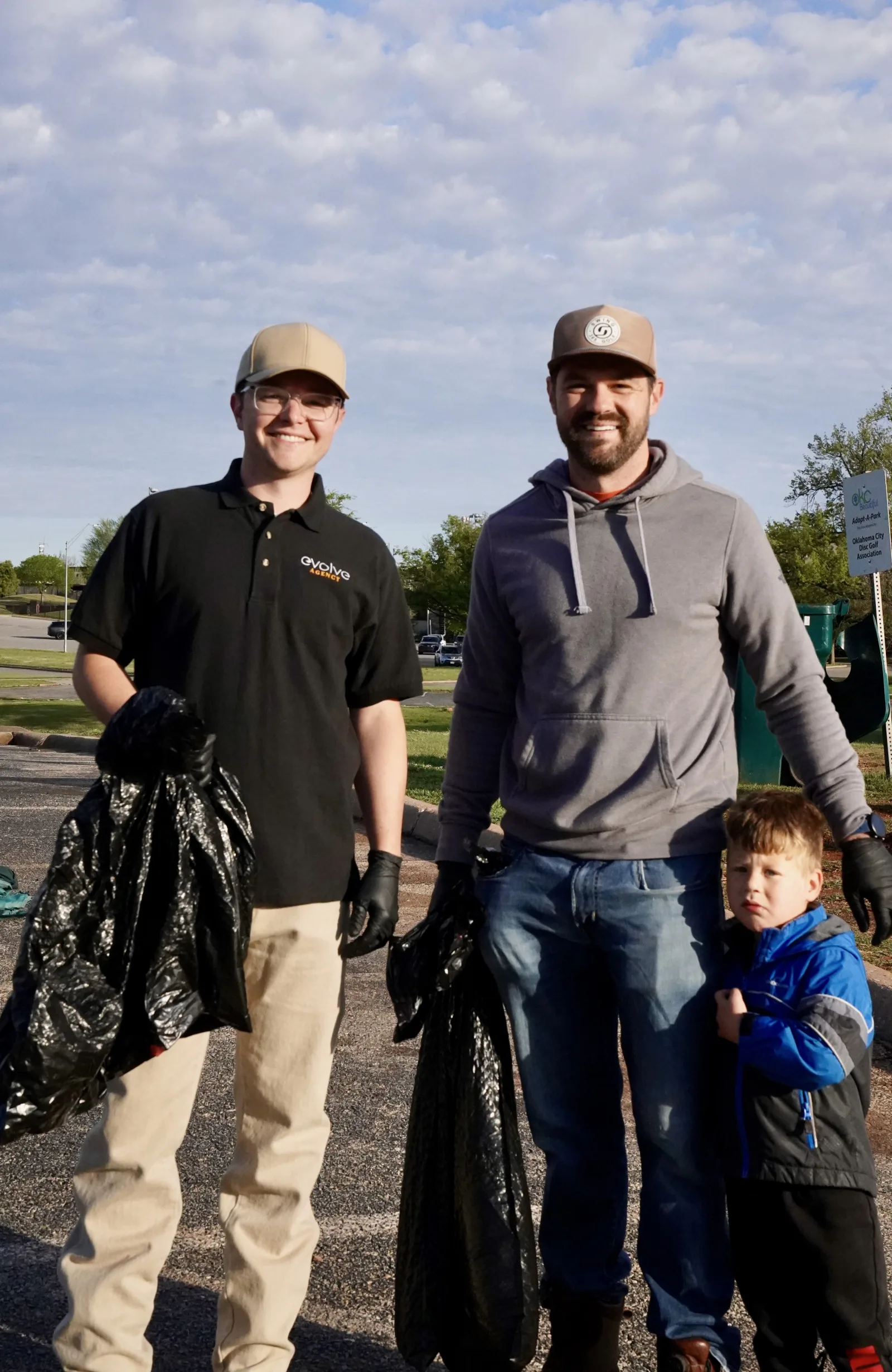 Community cleanup volunteers working at Will Rogers Park